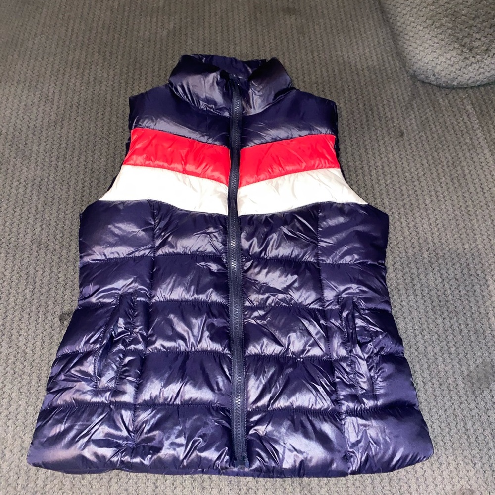 A size small red whit and blue vest